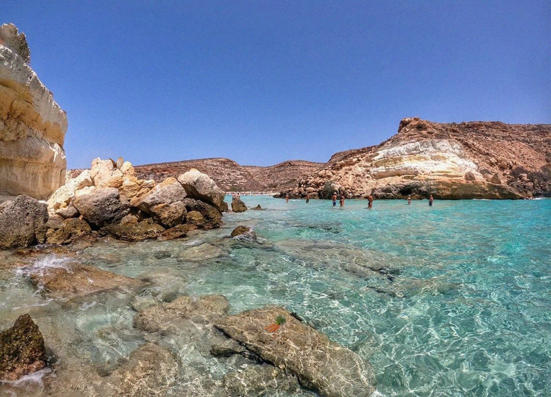 Foto de Playa Dei Conigli con muy limpia nivel de limpieza