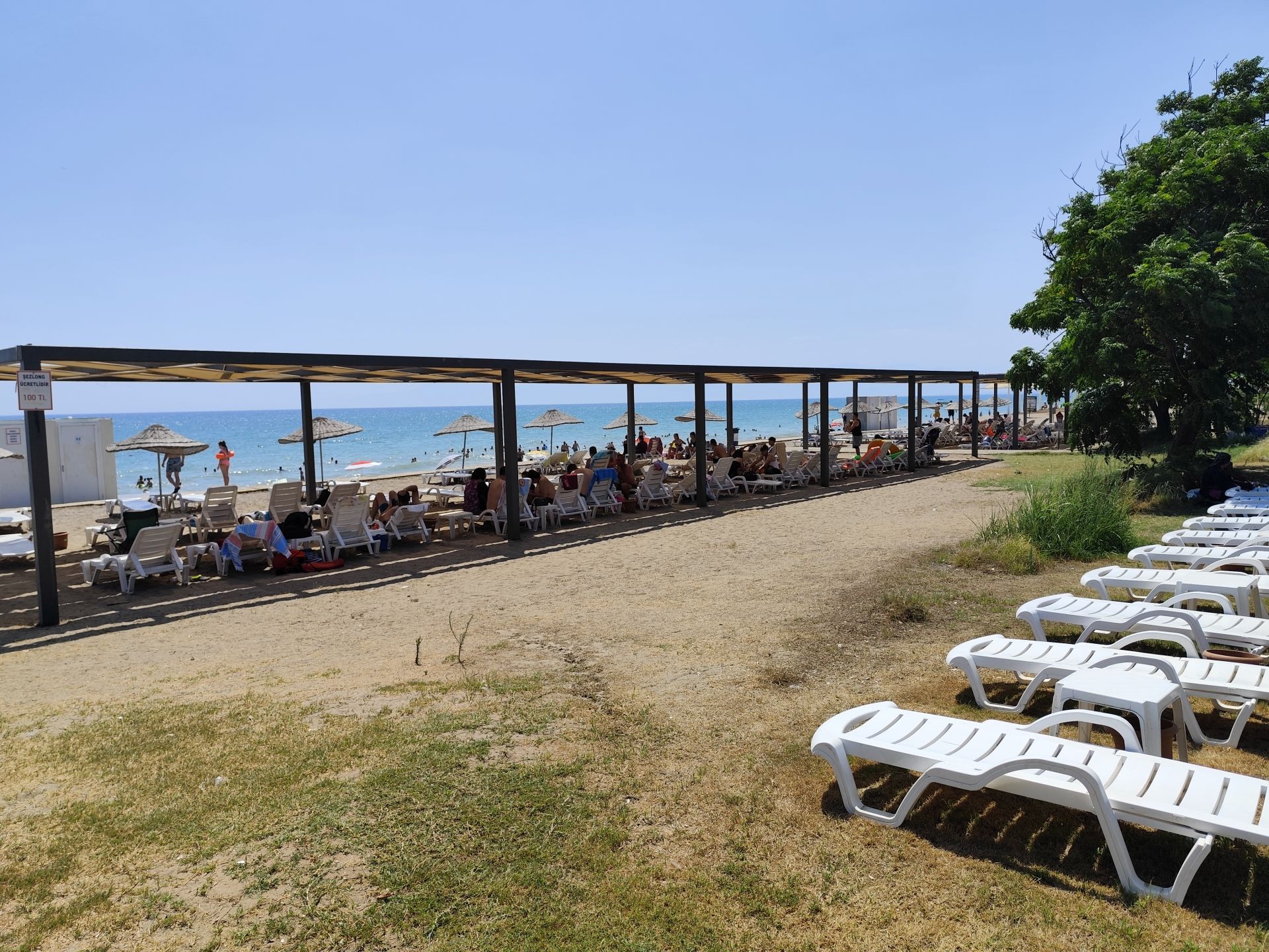 Foto de Belek Public beach con arena marrón superficie